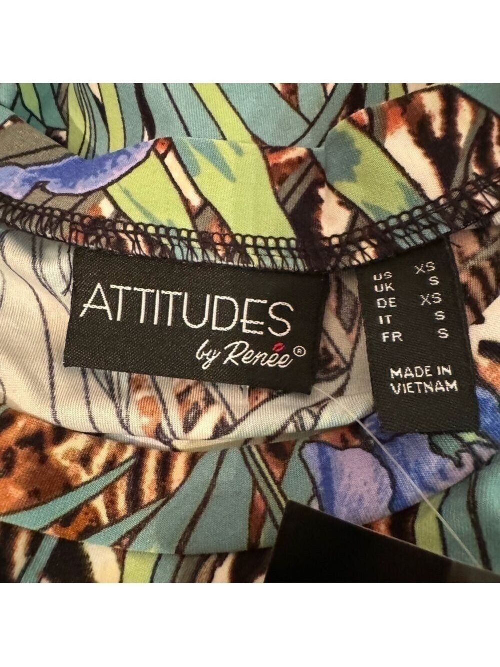 Attitudes by Renee Como Jersey Printed Godet Tunic w/ Pockets. New.
Size XS. - Picture 9 of 14
